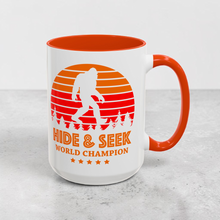 Load image into Gallery viewer, Funny Bigfoot Mug – “Hide & Seek World Champion” – Sasquatch Humor Coffee Mug, 15 oz Ceramic, Double-Sided Print