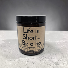 Load image into Gallery viewer, Funny Saying Candle – “Life Is Short… Be a Ho” – Vanilla Lace &amp; Pearls Scented Candle, 8 oz Amber Jar, Hand Poured

