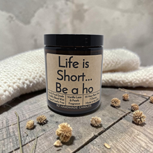 Load image into Gallery viewer, Funny Saying Candle – “Life Is Short… Be a Ho” – Vanilla Lace &amp; Pearls Scented Candle, 8 oz Amber Jar, Hand Poured
