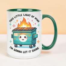 Load image into Gallery viewer, Dumpster Fire Mug 15 oz – Funny “This Little Light of Mine” Coffee Mug – Smiling Fire Dumpster Humor Mug – Ceramic Cup
