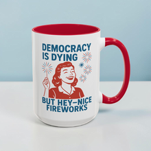 Load image into Gallery viewer, Democracy Is Dying Mug – “But Hey, Nice Fireworks” – Retro Woman Sparkler Design, 15 oz Funny Political Coffee Mug
