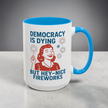 Load image into Gallery viewer, Democracy Is Dying Mug – “But Hey, Nice Fireworks” – Retro Woman Sparkler Design, 15 oz Funny Political Coffee Mug
