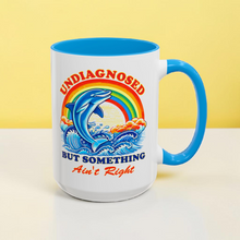 Load image into Gallery viewer, Funny Dolphin Mug – “Undiagnosed but Something Ain’t Right” – Sarcastic Humor Coffee Mug, 15 oz Ceramic, Double-Sided Print
