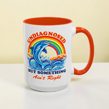Load image into Gallery viewer, Funny Dolphin Mug – “Undiagnosed but Something Ain’t Right” – Sarcastic Humor Coffee Mug, 15 oz Ceramic, Double-Sided Print
