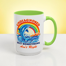 Load image into Gallery viewer, Funny Dolphin Mug – “Undiagnosed but Something Ain’t Right” – Sarcastic Humor Coffee Mug, 15 oz Ceramic, Double-Sided Print
